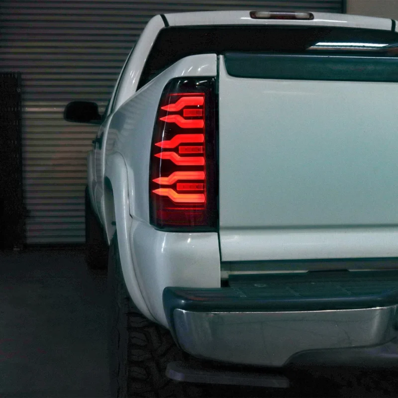 FITS 99-06 Chevrolet Silverado/99-06 GMC Sierra LUXX-Series LED Tail Lights Alpha-Black - Image 3