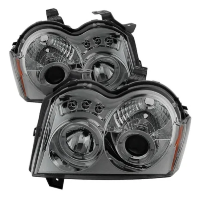 Fits ( Spyder Signature ) Jeep Grand Cherokee 05-07 Projector Headlights - LED Halo - LED ( Replaceable LEDs ) - Smoke - High H1 (Included) - Low 9006 (Not Included)