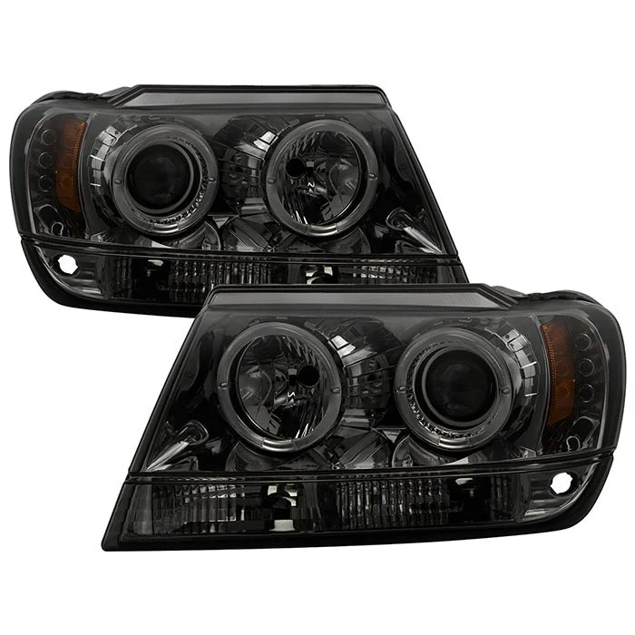 Fits ( Spyder Signature ) Jeep Grand Cherokee 99-04 Projector Headlights - LED Halo - LED ( Replaceable LEDs ) - Smoke - High 9005 (Not Included) - Low 9006 (Not Included)