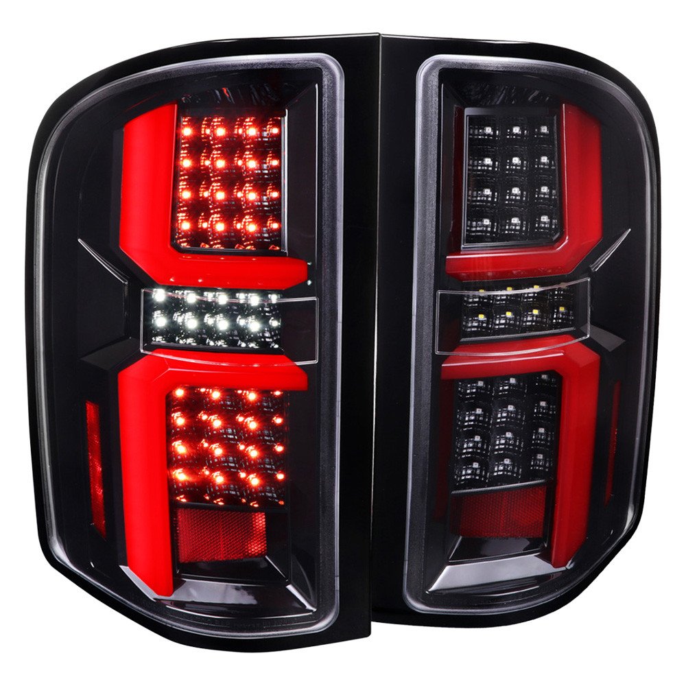 Fits 2007-2013 Chevrolet Silverado 1500/ 2007-2014 Silverado 2500HD/3500HD LED Tail Lights with Red LED Bar (Jet Black Housing/Clear Lens)